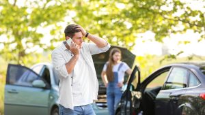 Man Calling after Car Accident