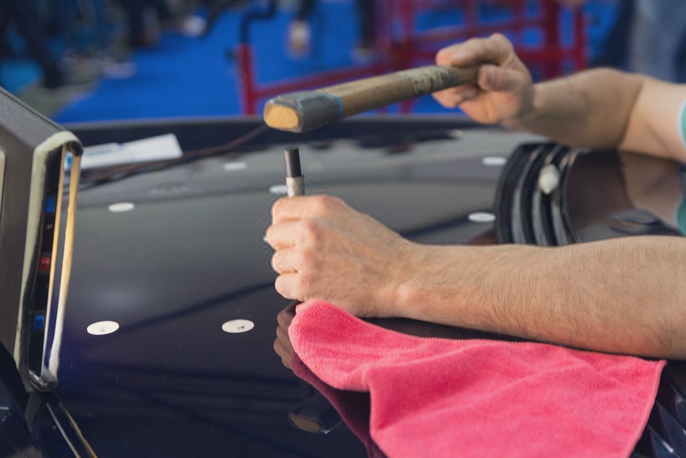 Does Insurance Cover Paintless Dent Repair? Denver Auto Claims Explained