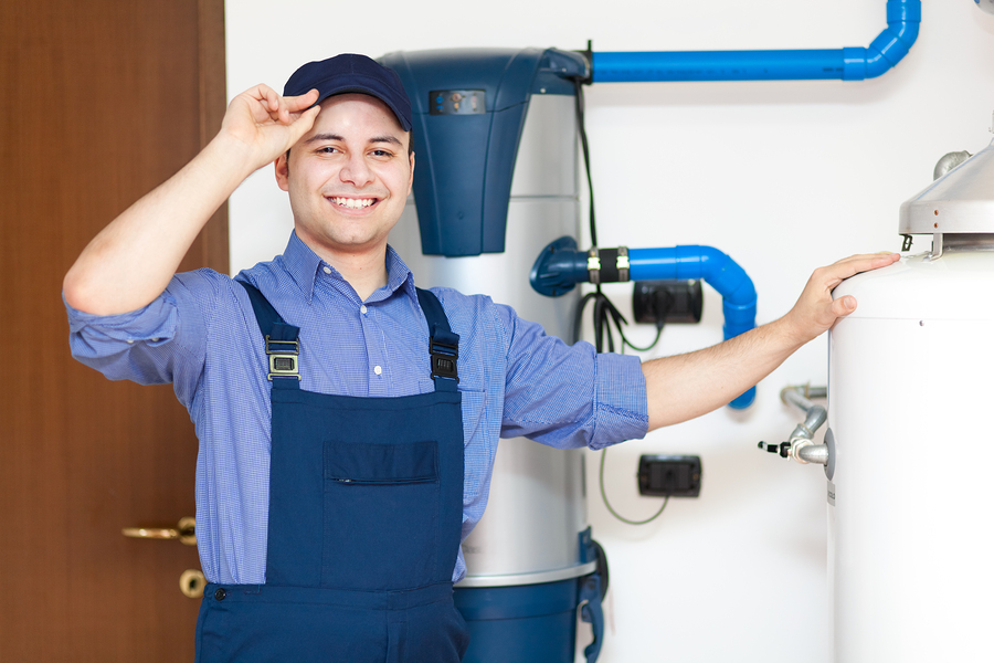 Technician servicing an hot-water heater